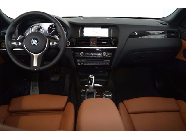 Left hand drive car BMW X4 (06/2017) - black